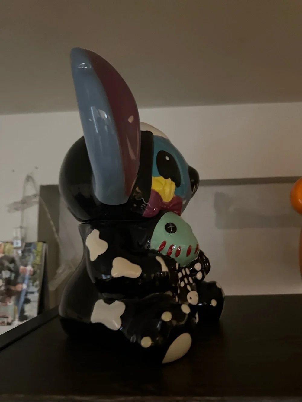 Whimsical Halloween Stitch Ceramic Figurine with doll.